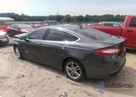 2015 Ford Fusion Titanium Hybrid z USA, uszkodzony, nr VIN 3FA6P0RU3FR166586